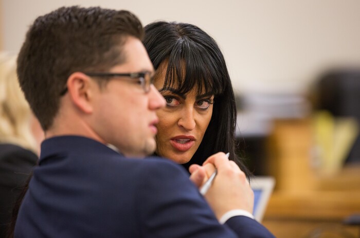 Torrey Green's attorney, Skye Lazaro talks to Cache County Prosecutor Spencer Walsh in the 1st District Court on Thursday — the second day of a three-day preliminary hearing. Green is charged with six counts of rape, one count of aggravated kidnapping, three counts of forcible sex abuse and two counts of object rape. (Tim Carpenter/Utah Statesman)