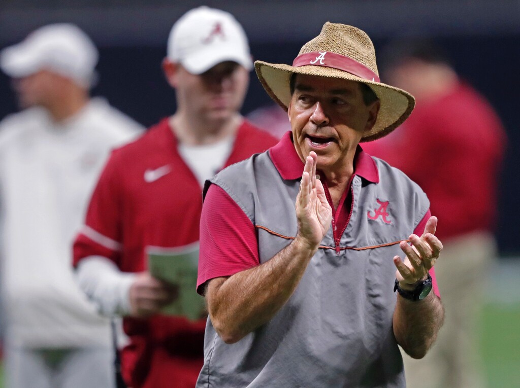 Alabama head coach Nick Saban walks through practice for the upcoming Sugar Bowl, which will be one of the CFP semi-final games, against Clemson, in New Orleans, Thursday, Dec. 28, 2017. (AP Photo/Gerald Herbert)