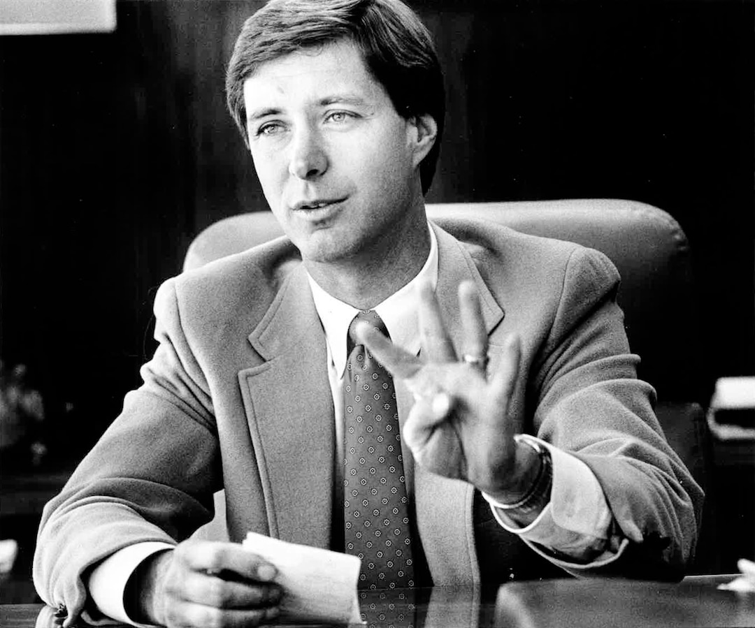 (Tribune File Photo)  University of Utah Athletic Director Dr. Chris Hill gives an interview to the Tribune in his office, November of 1987. The 37- year-old Hill was named athletic director a month earlier and he talked his objectives in administering the schools approximately $6 million athletics budget.