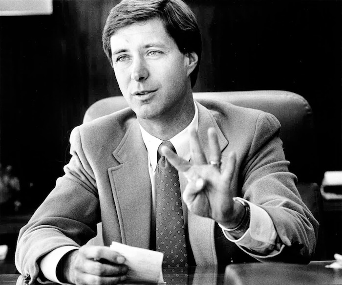 (Tribune File Photo)  University of Utah Athletic Director Dr. Chris Hill gives an interview to the Tribune in his office, November of 1987. The 37- year-old Hill was named athletic director a month earlier and he talked his objectives in administering the schools approximately $6 million athletics budget.