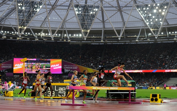 Morocco 's Fadwa Sidi Madane, right, leads a Women's 3000m Steeplechase heat during the World Athletics Championships in London Wednesday, Aug. 9, 2017. (AP Photo/David J. Phillip)