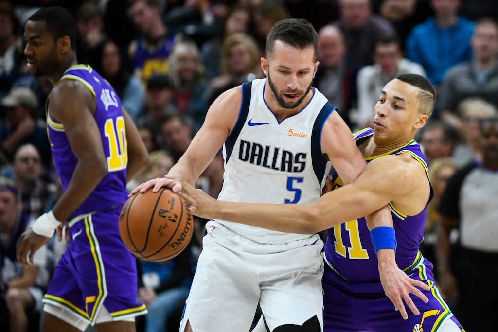 Utah Jazz guard Dante Exum (11) guards Dallas Mavericks guard J.J. Barea (5) during the first half of an NBA basketball game Wednesday, Nov. 7, 2018, in Salt Lake City. (AP Photo/Alex Goodlett)