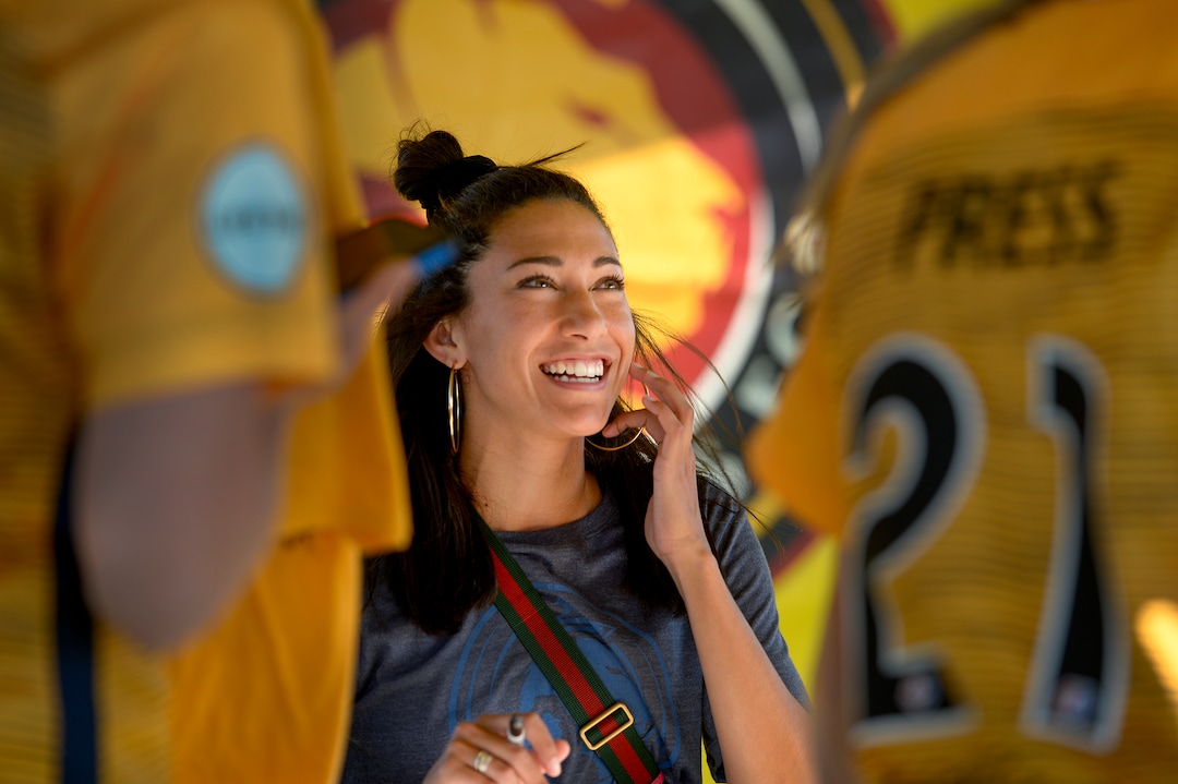 (Leah Hogsten  |  The Salt Lake Tribune) Christen Press, a member of the U.S. women's soccer team and newest addition to the Royals FC greets fans at the Carnival Real  at Rio Tinto Stadium in Sandy, Utah, Saturday, June 23, 2018.