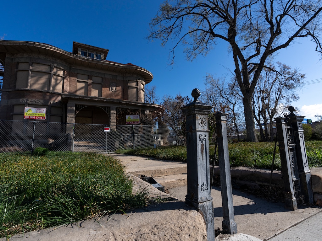 (Leah Hogsten | The Salt Lake Tribune)  Vandals have stolen the fence outside the Albert Fisher Mansion, March 31, 2022.