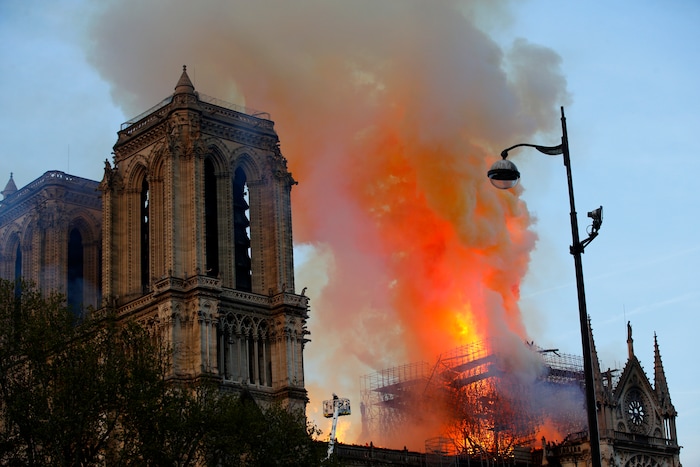 Firefighters use hoses as Notre Dame cathedral burns in Paris, Monday, April 15, 2019. A catastrophic fire engulfed the upper reaches of Paris' soaring Notre Dame Cathedral as it was undergoing renovations Monday, threatening one of the greatest architectural treasures of the Western world as tourists and Parisians looked on aghast from the streets below. (AP Photo/Francois Mori)