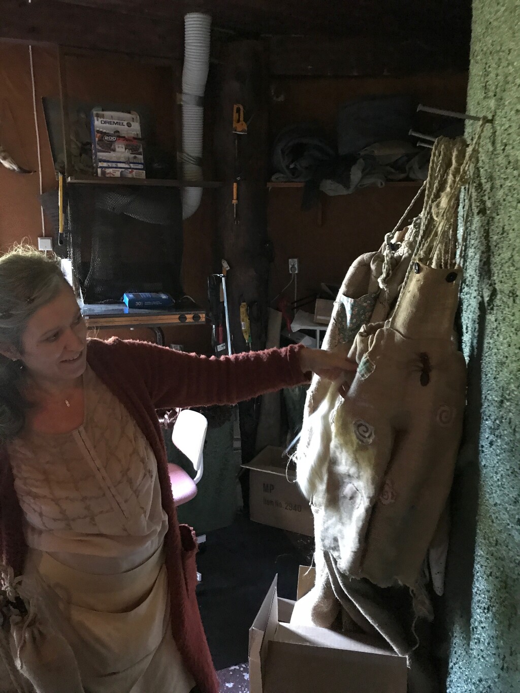 (Heather May  |  For The Tribune) Siw Rubach shows the costumes made for children who work at the troll museum, called Senjatrollet, on the Norwegian island of Senja.