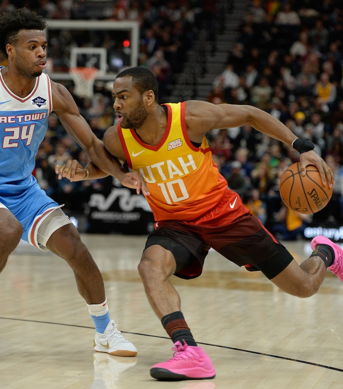 (Francisco Kjolseth  |  The Salt Lake Tribune)  Utah Jazz guard Alec Burks (10) tries to push past Sacramento Kings guard Buddy Hield (24) in the NBA game at Vivint Smart Home Arena Wed., Nov. 21, 2018, in Salt Lake City.