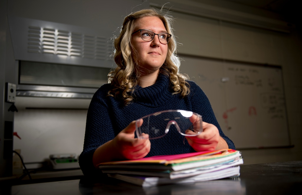 (Isaac Hale . | . Daily Herald, via AP) In this Monday, Nov. 11, 2019, photo, Cedar Valley senior Kennedy Hall poses for a portrait at Cedar Valley High School, in Eagle Mountain, Utah. A high school student who lost both her parents to heart attacks, she has been nominated for a prestigious scholarship on the strength of her idea for a CPR-assistance device.