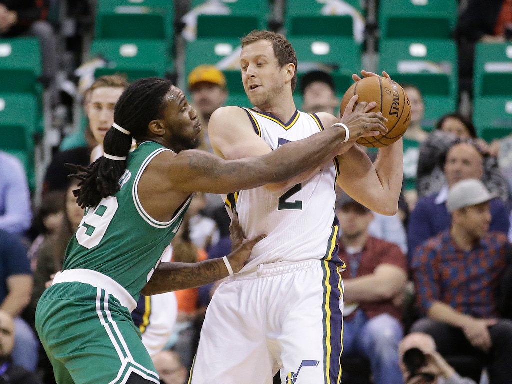 Boston Celtics forward Jae Crowder (99) defends against Utah Jazz forward Joe Ingles (2) in the first quarter during an NBA basketball game Monday, Jan. 26, 2015, in Salt Lake City. (AP Photo/Rick Bowmer)