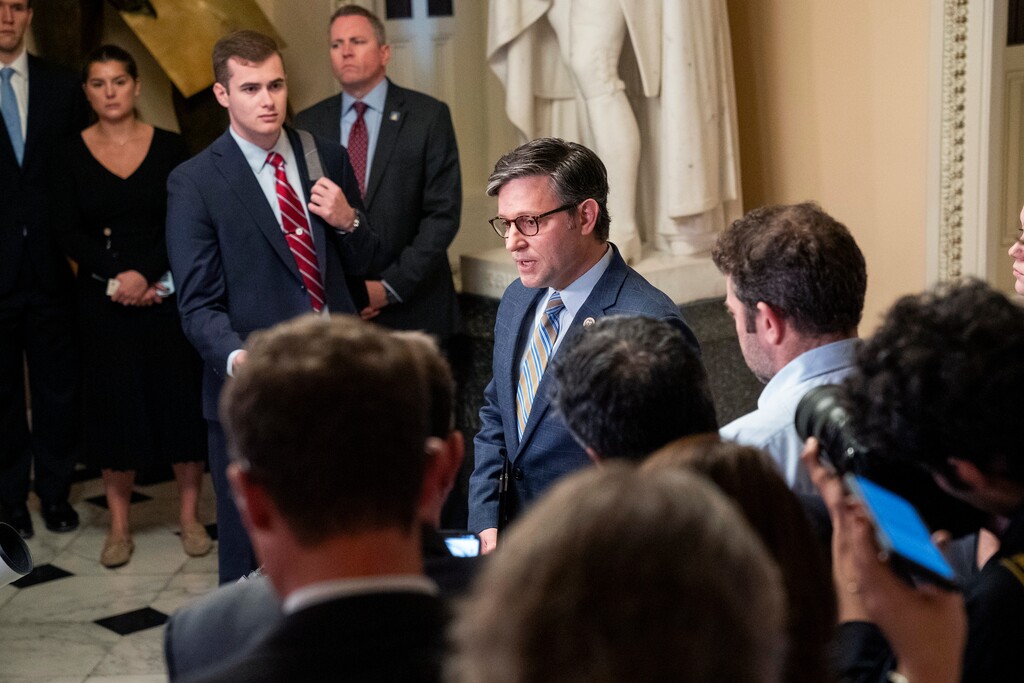 (Jacquelyn Martin | AP) House Speaker Mike Johnson, R-La., center, speaks about the mass shooting in Maine, Thursday, Oct. 26, 2023, on Capitol Hill in Washington.