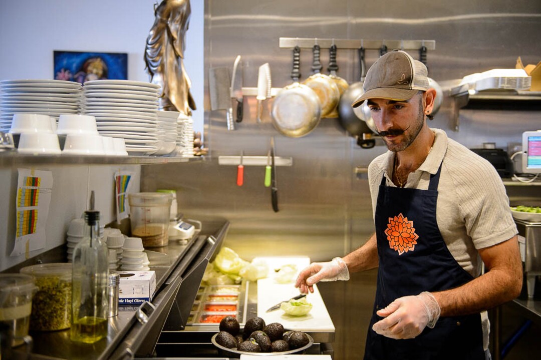 (Trent Nelson | The Salt Lake Tribune)
Owner Omar Abou-Ismail in the kitchen at Rawtopia Living Cuisine. The restaurant recently moved to Millcreek.