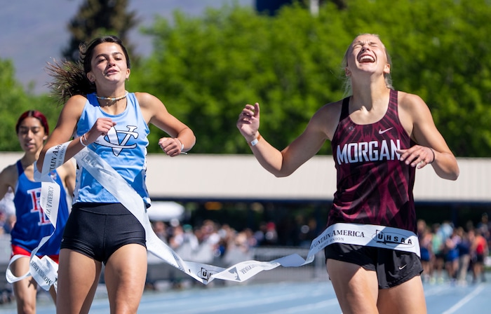 (Rick Egan | The Salt Lake Tribune)  Addy Pace, Canyon View is edge out by Grace Gordon from Morgan, in the 3A Girl's 400 meter finals, in the State High School Championship Track Meet at BYU, on Saturday, May 21, 2022.
