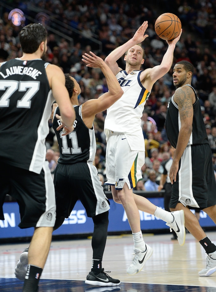 (Francisco Kjolseth  |  The Salt Lake Tribune)  Utah Jazz forward Joe Ingles (2) looks for an open teammate while battling the Spurs during the second half of the NBA basketball game in Salt Lake City, Thursday, Dec. 21, 2017.