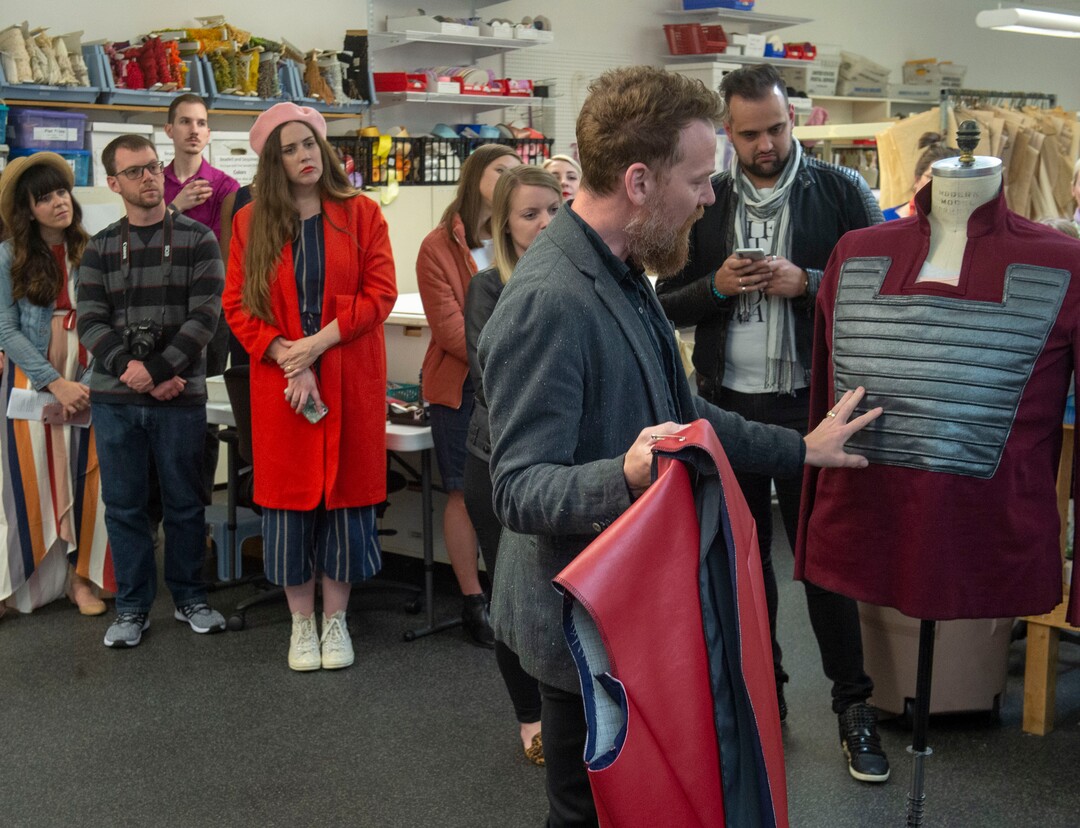 (Rick Egan  |  The Salt Lake Tribune)  "Project Runway" alum Bradon McDonald shows some of his original designs during a preview event for "Norma," at the Utah Opera Production Studios, Monday, April 15, 2019.