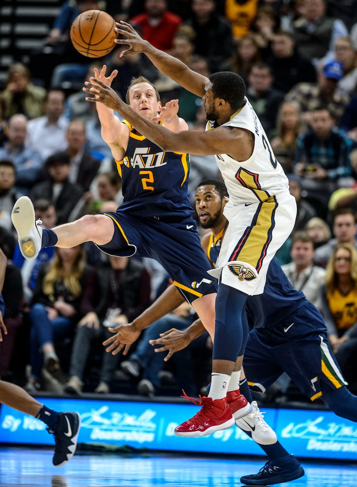(Steve Griffin  |  The Salt Lake Tribune) Utah Jazz forward Joe Ingles (2) leaps to try and get to a pass by New Orleans Pelicans forward Darius Miller (21) during the the Utah Jazz versus the New Orleans Pelicans NBA basketball game at the Vivint Smart Home Arena in Salt Lake City Wednesday January 3, 2018.