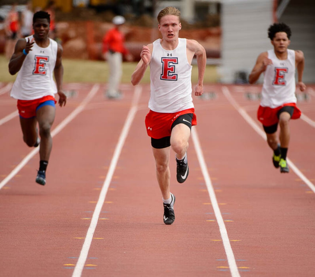 (Trent Nelson | The Salt Lake Tribune)  East track star Will Prettyman, one of the state's best long jumpers and sprinters, competing in the 100m, Thursday April 5, 2018.