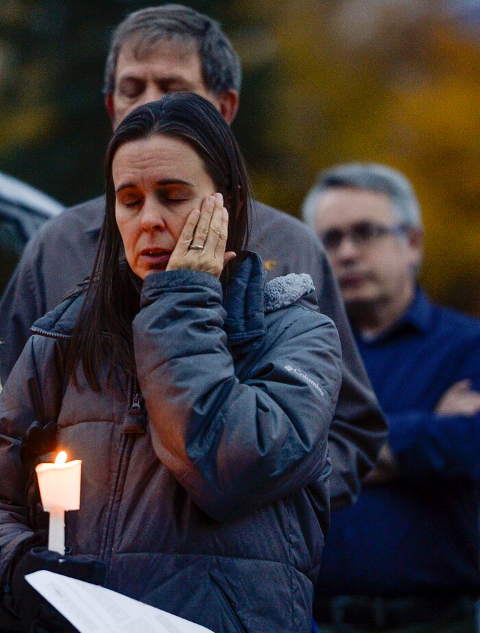 Leah Hogsten | The Salt Lake Tribune Candles are lit and prayers are given outside Chabad Lubavitch of Utah as members of Utah's Jewish and interfaith communities held a vigil and prayer service, Monday, Oct. 29, 2018 for the 11 people killed at the Tree of Life Synagogue in Pittsburgh, Monday, Oct. 29, 2018, "for peace, harmony and love to once again reign supreme upon this Earth."