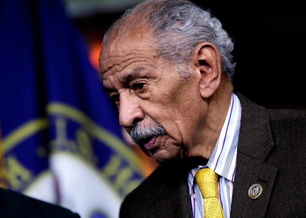 FILE -- In this file photo from Tuesday, Feb. 14, 2017, Rep. John Conyers, D-Mich., attends a news conference on Capitol Hill in Washington.  House Minority Leader Nancy Pelosi, D-Calif., the top Democrat in the House, said today, Thursday, Nov. 30, 2017, that Conyers should resign, saying the accusations are "very credible."  (AP Photo/J. Scott Applewhite, file)