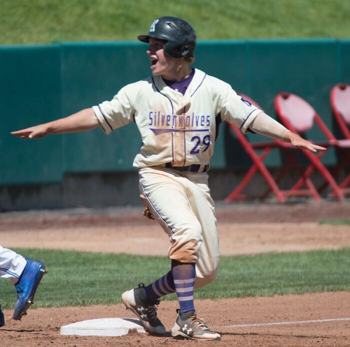 (Rick Egan  |  The Salt Lake Tribune)  Riverton runner Gaige Morris celebrates after being called safe at thirdbase, in 6A state baseball championship action between Riverton and Bingham, at UVU in Orem, Friday, May 25, 2018.