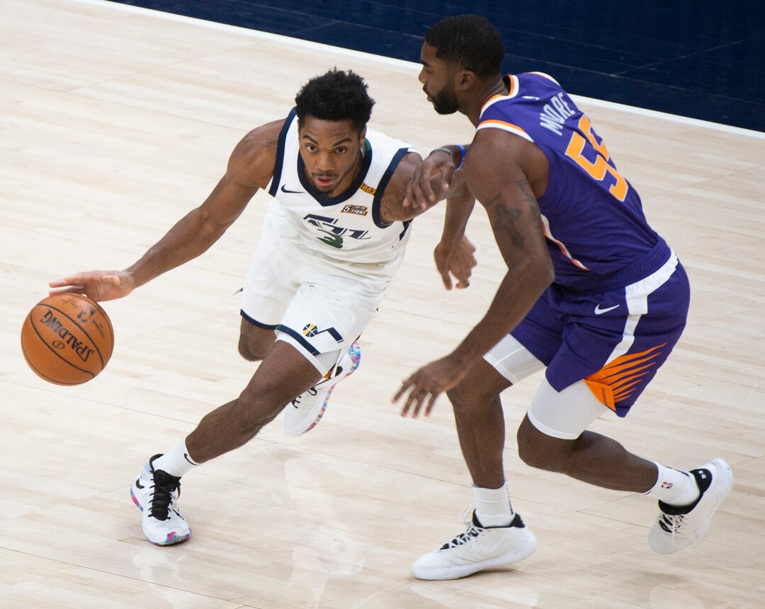 (Rick Egan | The Salt Lake Tribune)  Utah Jazz guard Shaquille Harrison (3) dribbles inside as Phoenix Suns guard E'Twaun Moore (55) defends, in preseason NBA action between Utah Jazz and Phoenix Suns at Vivint SmartHome Area, on Saturday, Dec. 12, 2020.