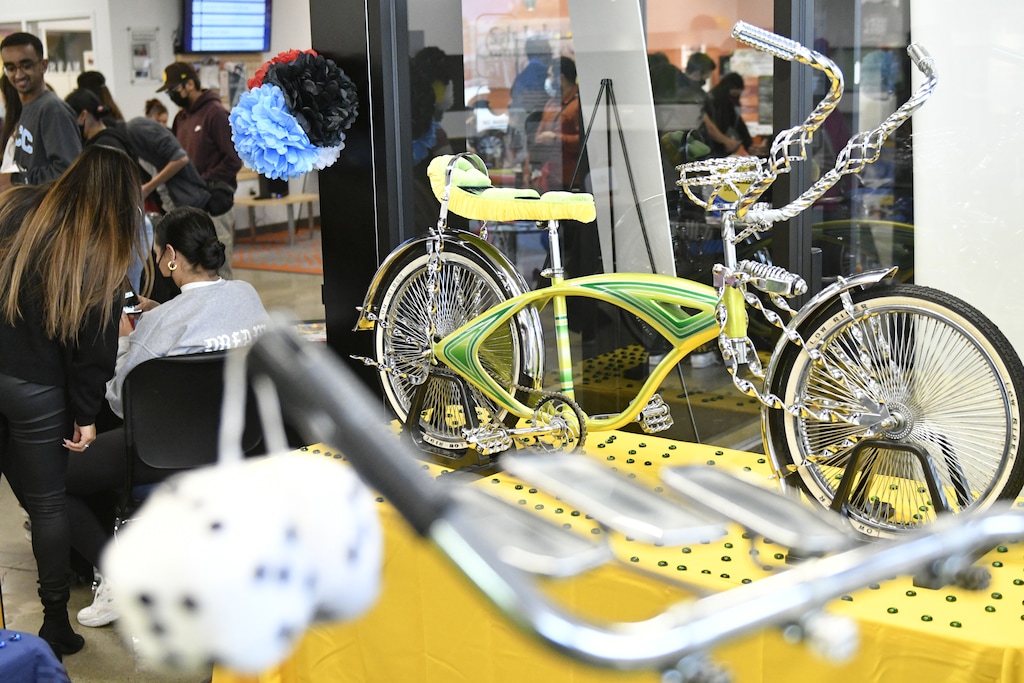 SLCC lowrid(Steve Speckman  |  Salt Lake Community College) Lowrider bikes were part of the "Redefining Chicanidad" event in October 2021 at Salt Lake Community College's West Valley Center — an event aimed at connecting education and Hispanic cultural identity. The school is working toward earning the federal designation of a "Hispanic-serving institution."er bike