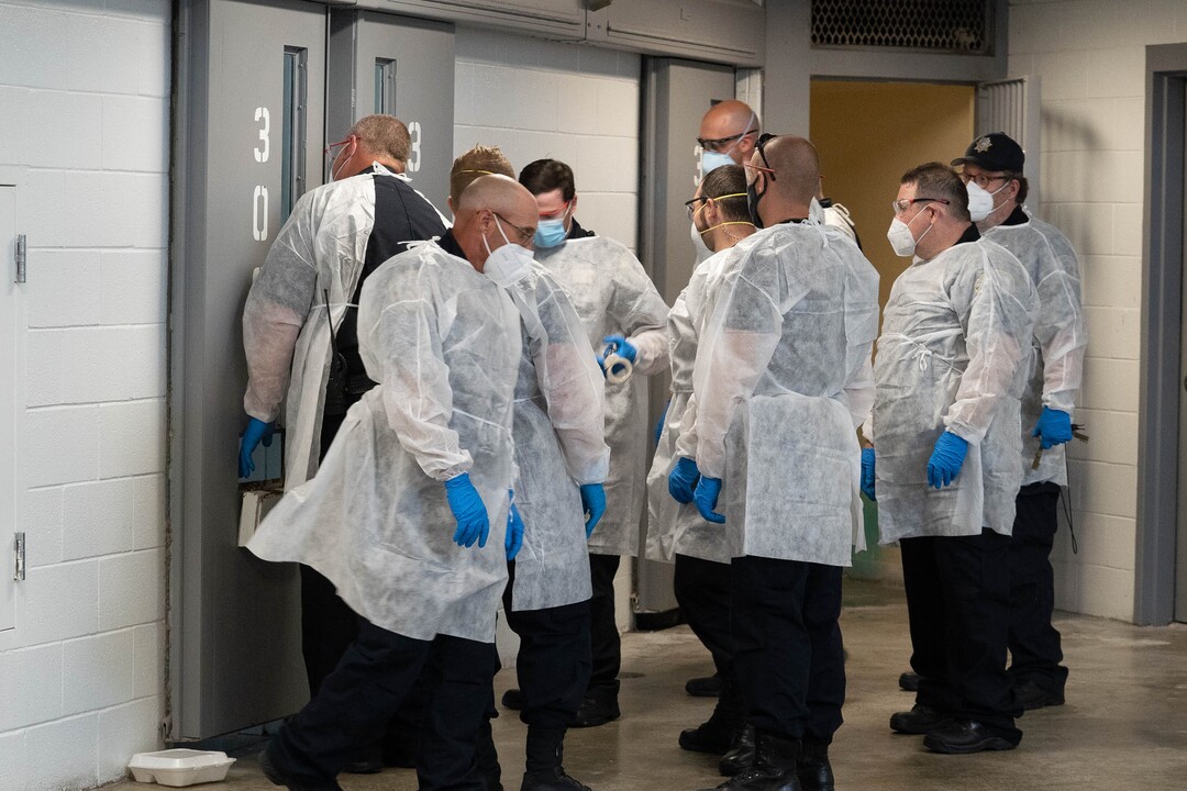 (Francisco Kjolseth | The Salt Lake Tribune) Prison staff work to safely move inmates from their cells into the common day room to be vaccinated against COVID-19 during a vaccination event with interested incoming inmates at the Utah State Prison in Draper on Tuesday, July 27, 2021.