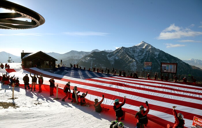 (Al Hartmann  |  The Salt Lake Tribune) 	Sundance Mountain Resort partnered with Follow the Flag to ski a giant American Flag down Bearclaw run. The flag is 78' x 150' and weighs more than 400 pounds, the largest free-flying American flag in the world. It took coordination of 50 of Sundance's best skiers to pull it off.  They did a dry run unfurling the massive flag at the top of the mountain before putting on the skis. This event is to express patriotism and support of Team USA and athletes representing the country in the upcoming Winter Olympics in Pyeongchang, South Kore