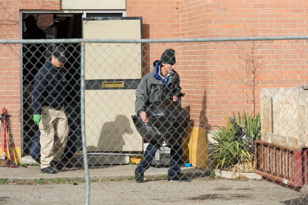 Alex Gallivan  |  Special to the Tribune 

Various agencies from Salt Lake City perform an evacuation of remaining tenants at The Georgia Apartments, Saturday February, 2019
