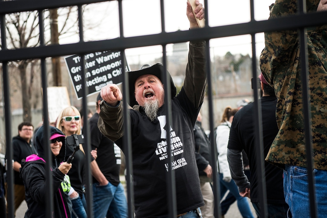(Chris Detrick  |  The Salt Lake Tribune)  Participants yell at people gathered for the March for Our Lives rally during the March Before Our Lives rally near West High School in Salt lake City Saturday, March 24, 2018.