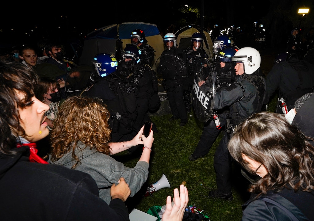 (Chris Samuels | The Salt Lake Tribune) Police from multiple jurisdictions form a line to disperse protesters during a demonstration in support of Palestine at the University of Utah, Monday, April 29, 2024.