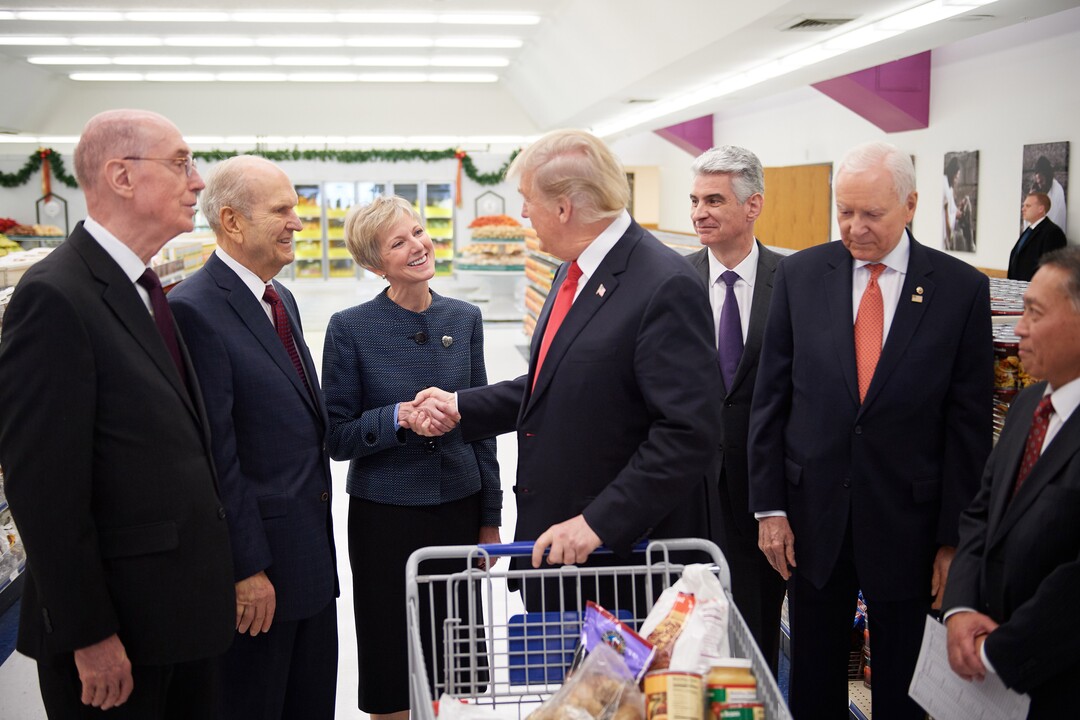 (Courtesy of LDS Church)  President Donald J. Trump shakes the hand of Sister Jean B. Bingham, Relief Society general president.