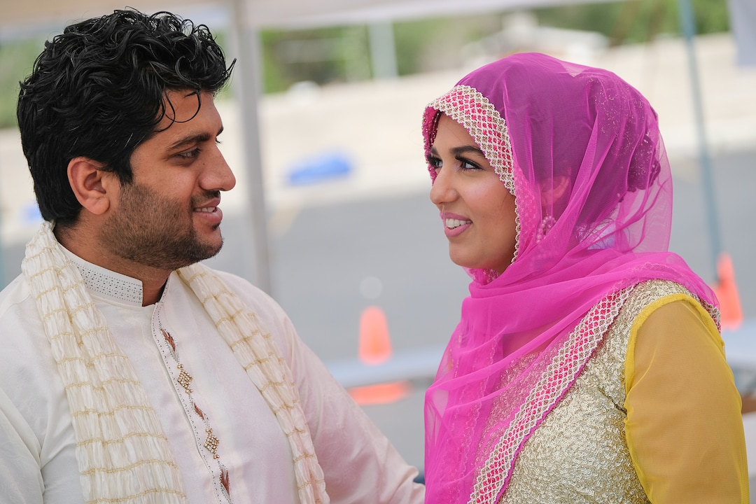 (Francisco Kjolseth  |  The Salt Lake Tribune)  Syed Hashmi joins his wife Samara with festivities as members of the Khadeeja Islamic Center in West Valley City mark the end of Ramadan, a 30 day period of fasting and spiritual growth on Wed. June 5, 2019.