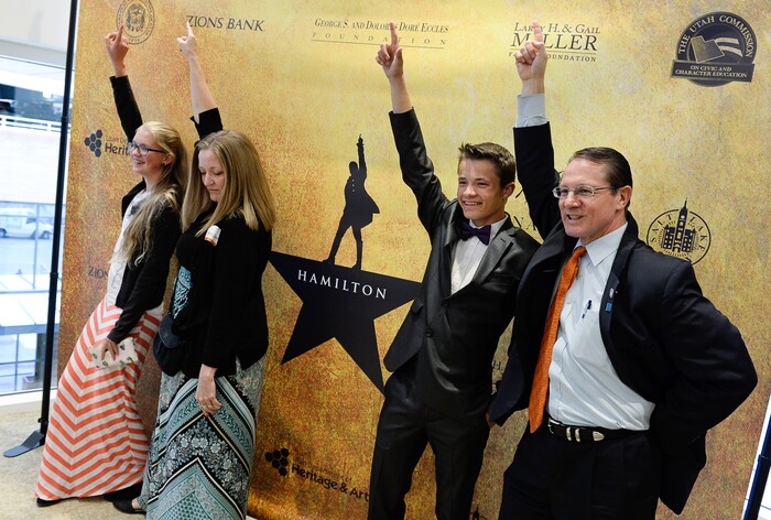 (Francisco Kjolseth  |  The Salt Lake Tribune)  Students Eden Ward, left, and Brandon Barnhisel, both 15, strike a pose with Rep. Ken Ivory, R-West Jordan, and his wife Becky on Thursday, April 19, 2018, as they get ready to watch Hamilton on Thursday, April 19, 2018. The two students were among many who won tickets to attend with a legislator after writing an essay on topics important to them. 