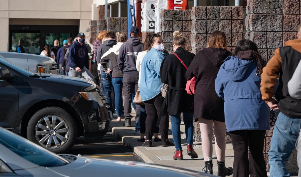 (Francisco Kjolseth  |  The Salt Lake Tribune) People line up outside the Cottonwood Heights liquor store the day before Thanksgiving on Wednesday, Nov. 25, 2020, on what is typically the busiest sales day of the year for the Utah Dept. of Alcohol Beverage Control.