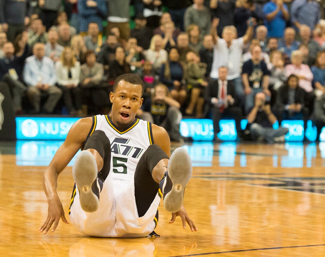 Rick Egan  |  The Salt Lake TribuneUtah Jazz guard Rodney Hood (5) hits the floor, after being fouled while shooting a 3-point shot, in NBA action, The Utah Jazz vs. The Houston Rockets, in Salt Lake City, Monday, January 4, 2016.