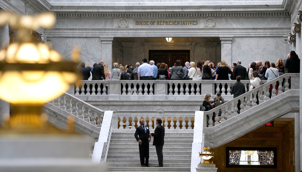 (Al Hartmann  |  Tribune file photo) Citizens and lobbyists waiting to bend the ear of their legislators crowd the entranceway to the Utah House of Representatives Thursday February 13.