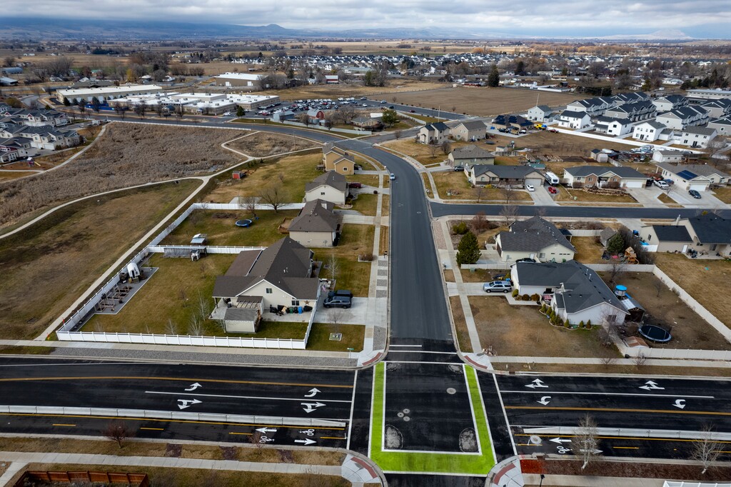(Rick Egan | The Salt Lake Tribune) An intersection on 1200 West in Nibley on Thursday, Feb. 12, 2026. The city installed "mountable islands" in the corners of multiple intersections to help slow traffic, but removed them after receiving public backlash.

