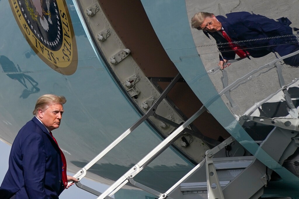 (Patrick Semansky | AP photo)

In this Dec. 31, 2020, photo, President Donald Trump boards Air Force One at Palm Beach International Airport in West Palm Beach, Fla.