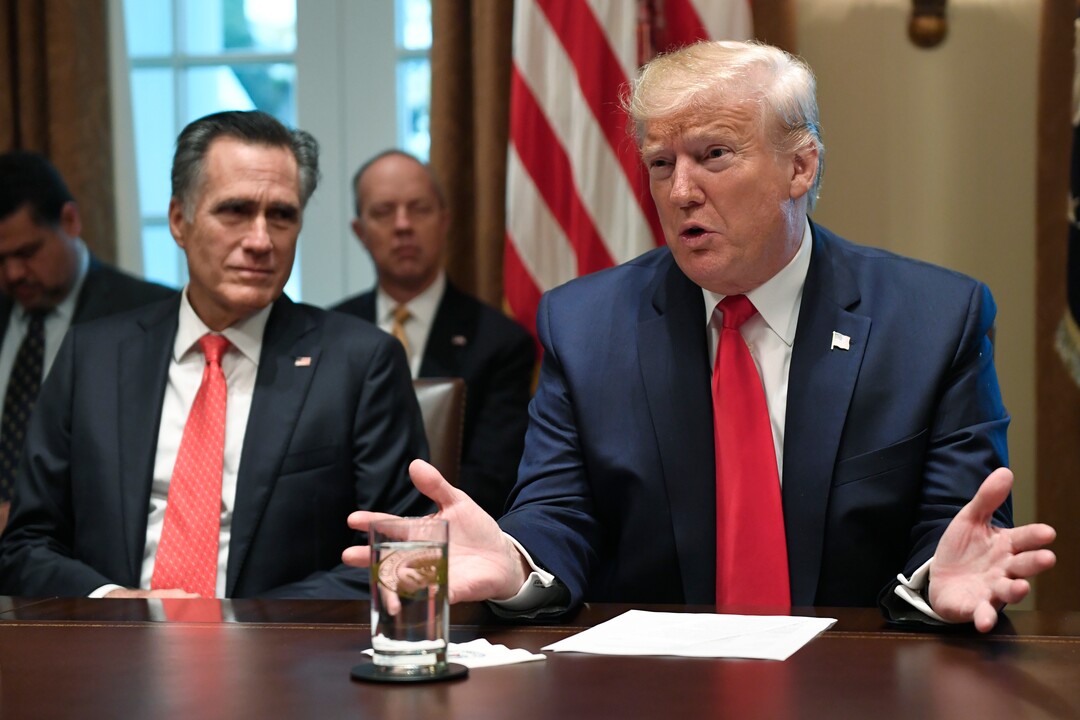 (Susan Walsh | AP) President Donald Trump, right, speaks as he sits next to Sen. Mitt Romney, R-Utah, left, as they participate in a meeting in the Cabinet Room of the White House in Washington, Friday, Nov. 22, 2019, on youth vaping and the electronic cigarette epidemic.