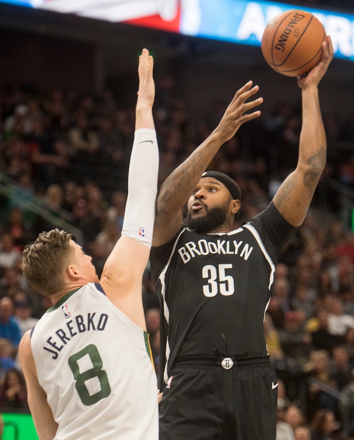 (Rick Egan  |  The Salt Lake Tribune) Brooklyn Nets forward Trevor Booker (35) takes a shot, as Utah Jazz forward Jonas Jerebko (8) defends, in NBA action, Utah Jazz vs. Brooklyn Nets, in Salt Lake City, Saturday, November 11, 2017.