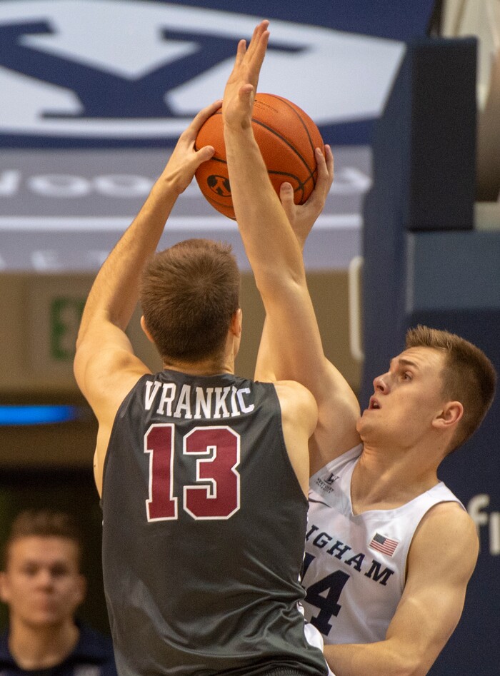 (Rick Egan  |  The Salt Lake Tribune)       Santa Clara Broncos forward Josip Vrankic (13) takes a shot as Brigham Young Cougars guard Connor Harding (44) defends, in basketball action between Brigham Young Cougars and Santa Clara Broncos at the Marriott Center in Provo, Saturday, Jan. 12, 2019.


