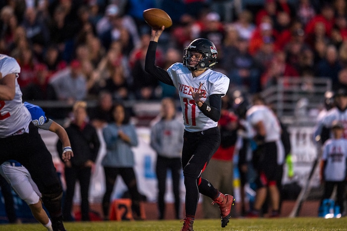 (Chris Detrick  |  The Salt Lake Tribune)  Weber's Austin Bartholomew (11) throws a touchdown pass to Weber's Haden Garner (3) during the game at Fremont High School Thursday, October 5, 2017. 