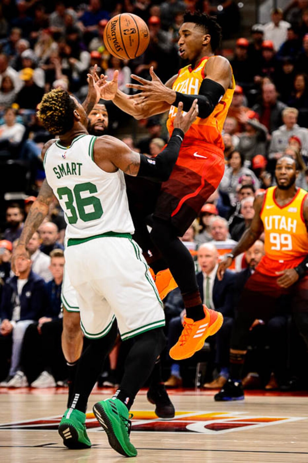 (Trent Nelson | The Salt Lake Tribune)  Utah Jazz guard Donovan Mitchell (45) defended by Boston Celtics guard Marcus Smart (36). Utah Jazz vs. Boston Celtics, NBA basketball in Salt Lake City on Friday Nov. 9, 2018.