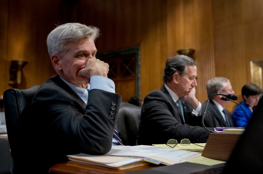 Sen. Bill Cassidy, R-La., left, and former Pennsylvania Sen. Rick Santorum, second from left, appear before a Senate Finance Committee hearing to consider the Graham-Cassidy healthcare proposal on Capitol Hill, Monday, Sept. 25, 2017, in Washington. (AP Photo/Andrew Harnik)