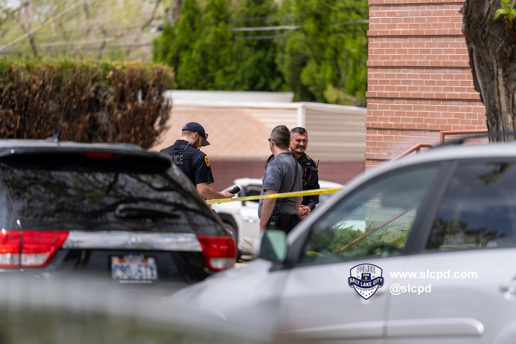 (SLCPD) Salt Lake City police investigate after two people were found dead in an office complex on Saturday, May 13, 2023. Salt Lake City police said Monday that a father is accused of killing his 16-year-old son before killing himself.