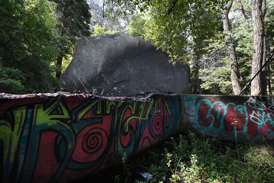 (Francisco Kjolseth  |  The Salt Lake Tribune)  Graffiti has proliferated in lower Little Cottonwood Canyon, where vandals, often wielding cans of fluorescent-colored spray paint, have covered granite faces, trees and structures. The vandalism is particularly apparent along the Temple Quarry Trail and the creek at the Moon Rock swimming hole and former pavilion site. Volunteers using donated equipment and solvents spend thousands of hours removing the paint from the rocks only to see graffiti return to the same faces or on rock nearby.