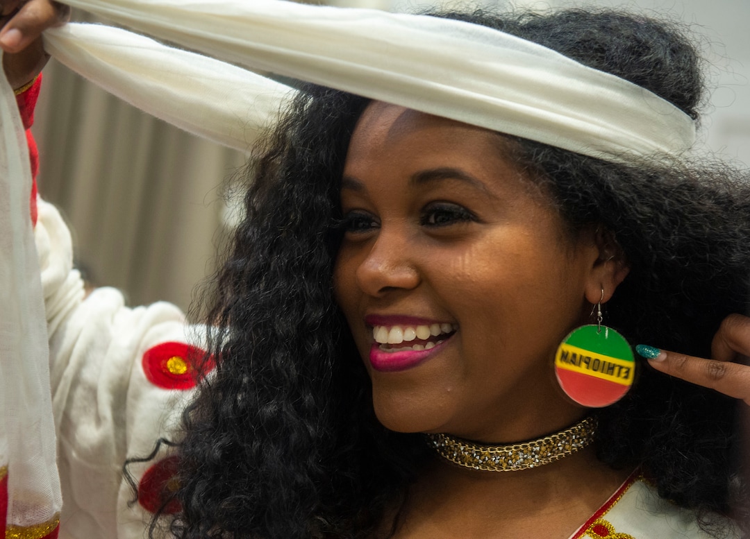 (Rick Egan  |  The Salt Lake Tribune)     Jojo Beyene, prepares to walk the runway, representing Ethiopia, at the 9th annual Women of the World Fashion Show Gala, Wednesday, March 6, 2019.