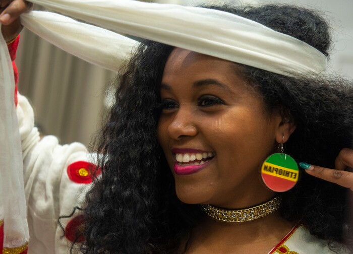 (Rick Egan | The Salt Lake Tribune) Jojo Beyene, prepares to walk the runway, representing Ethiopia, at the 9th annual Women of the World Fashion Show Gala, Wednesday, March 6, 2019.