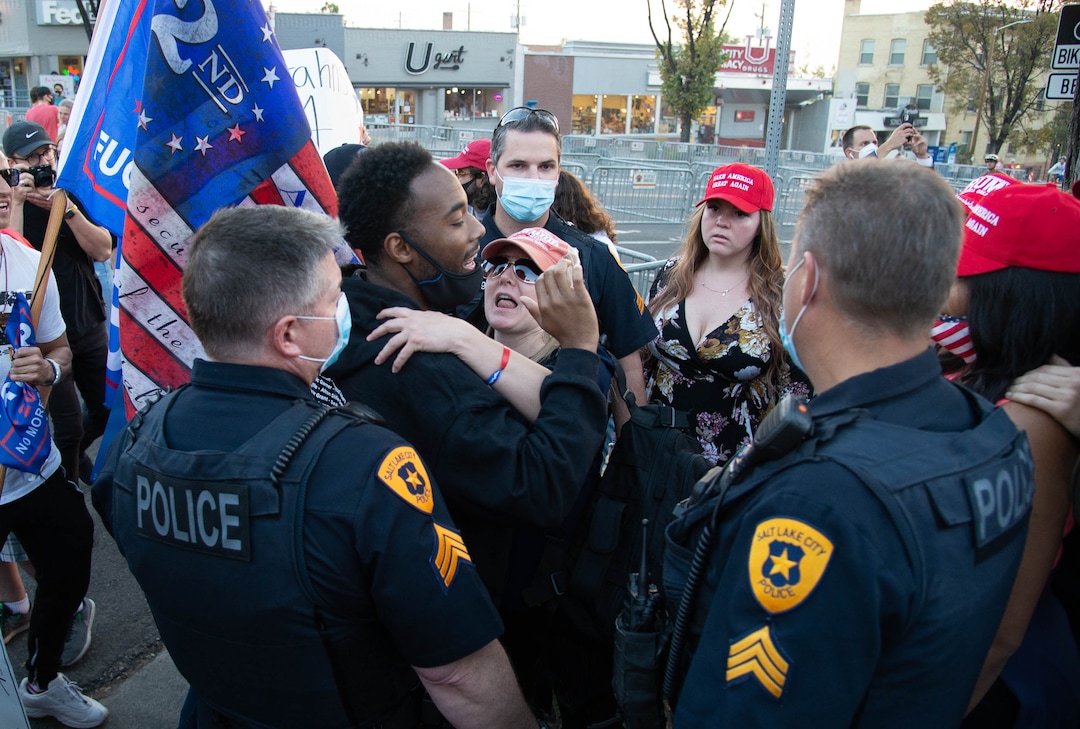 (Francisco Kjolseth  |  The Salt Lake Tribune) Supporters and counter protesters of President Donald Trump rally near Kingsbury Hall on the University of Utah campus in Salt Lake City on Wednesday, Oct. 7, 2020, during the vice presidential debate.