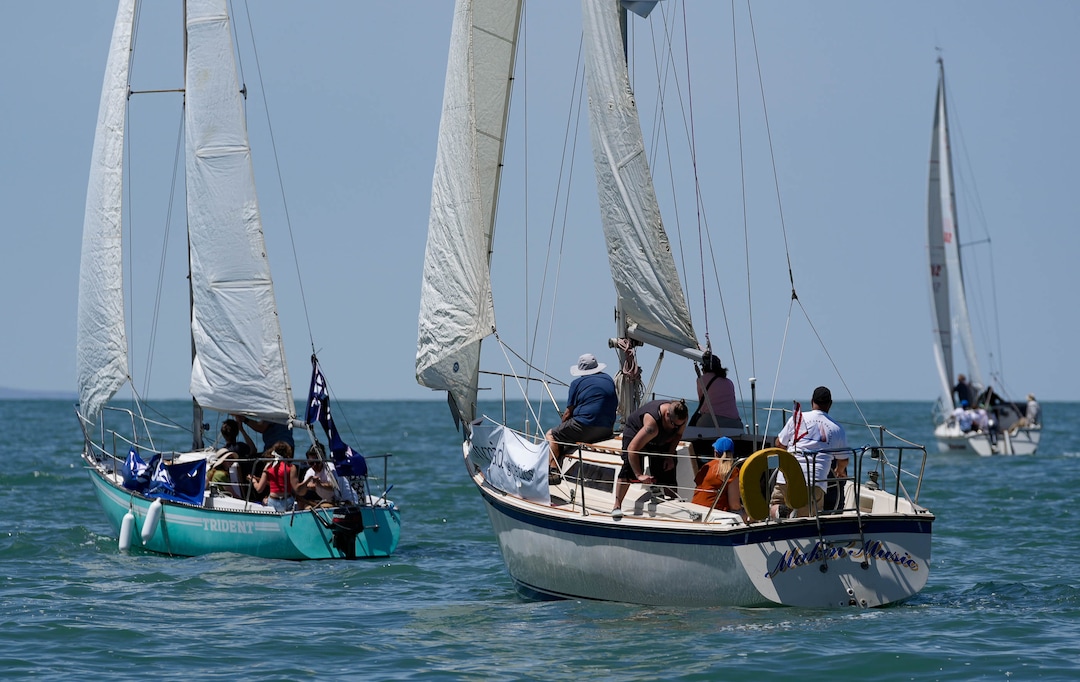 (Francisco Kjolseth  |  The Salt Lake Tribune) Sailfest regatta returns to the Great Salt Lake following a five-year hiatus due to low lake levels and the pandemic on Saturday, June 15, 2024. Hosted by the Great Salt Lake Yatch Club and Grow the Flow, the event seeks to get people out to the lake and raise awareness of and engagement with efforts to save it. 